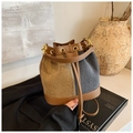 Detail of color-block bucket bag with canvas texture and gold metal hardware accents - Khaki and Black (18928)