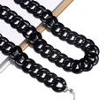 Dettaglio catena per occhiali a maglie nere con anelli in silicone e molla metallica - Nero