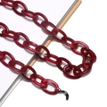 Detail of dark red acrylic chain with marble texture and black rubber end loops - Wine Red Marble (5)