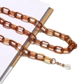 Détail d'une chaîne à lunettes en acrylique ambré avec clips métalliques et boucles - Ambre (10)