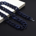 Macro detail of dark blue acrylic eyeglass chain with marble texture and silicone loops - Dark Blue