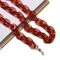 Dettaglio catena per occhiali in acrilico ambrato con connettori in silicone bianco - Marrone/Ambra