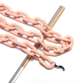 Detailed view of pink acrylic eyeglass chain with secure silicone rubber loops - Nude Pink