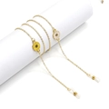 Golden eyewear chain with daisy pendants and non-slip silicone loops on a white background - Golden Daisy (GL1039)