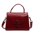 Elegant wine red patent leather handbag with trapezoid flap and metal buckle detail - Burgundy