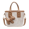 Beige-braune Eimertasche mit Blumenprägung und süßem Welpen-Anhänger-Detail - Ohne Anhänger / Cremeweiß mit Braun