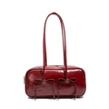 Dark red patent leather shoulder bag featuring decorative double bows on the front - Red