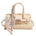 Fashionable cream square handbag with silk scarf handle and metal turn-lock closure - White