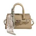 Beige square handbag featuring a silk scarf-wrapped handle and classic silver turn-lock - Green