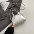 Chic silver semi-circular crossbody bag with metallic finish and top handles - Silver