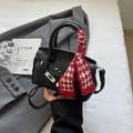 Black lychee leather top handle bag with red and white plaid silk scarf detail - Black