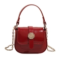 Mini retro crossbody saddle bag in shiny red patent leather with silver metal buckle - Red