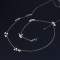 Golden metal eyewear chain with white baroque pearls and silicone loops for glasses - Gold Pearl Style (GL916)
