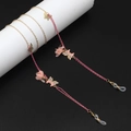 Detail of pink chiffon flower and enamel butterfly charms on a gold eyeglass chain - Gold Pink Chiffon Flower Butterfly Style / Pink