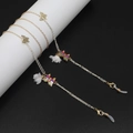 Chaînes à lunettes papillon colorées avec maillons or et argent sur fond noir élégant - Style Fleur Papillon Ajouré Blanc Argent / Blanc