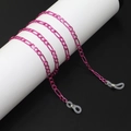 Rose pink metal Figaro chain eyewear strap with silicone loops on black background - Figaro Chain Style / Rose Red