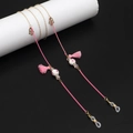 Handmade pink beaded eyewear chain with floral ceramic beads and decorative tassels - Pink
