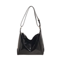 Minimalist black patent leather hobo bag with adjustable strap and glossy finish - Black