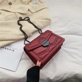 Red quilted leather crossbody bag with rivet details and dark metal chain strap - Burgundy
