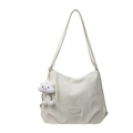 Elegant off-white faux leather tote bag with a cute plush cloud charm for summer fashion - Off-white With Pendant