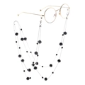Dual-use black crystal beaded eyewear chain and long sweater necklace on white background - Black