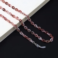 Detalle de cadena acrílica jaspeada para gafas con cierre de mosquetón de plata - Rojo Vino Degradado