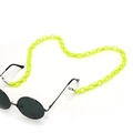Macro view of neon yellow acrylic glasses chain with silicone anti-slip loop connectors - Yellow