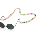 Close-up of colorful acrylic eyeglass chain with secure silicone anti-slip loops - Black White Gold Splatter