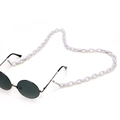 Detail showing chunky white acrylic link chain attached to black round sunglasses frame - 4 White