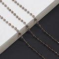 Catena artigianale in cristallo grigio con anelli dorati per occhiali e maschere - Grigio fumo