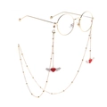 Golden beaded glasses chain with red heart and white wing charms on white background - Red Heart Wings Charm Style (GL792) / Gold