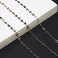 Golden star eyeglass chain with handmade metallic links on a minimalist background - Gold