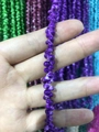 Primer plano de cuentas en espiral moradas para cadenas de gafas y joyería - Morado