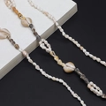 Handmade golden eyewear chain with natural seashells and conches for a beach style - Gold Shell Conch Style