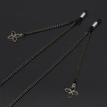 Fashionable black and gold braided glasses chain featuring elegant clover pendants - Black Gold Woven Clover Style