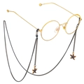 Modieuze gouden ronde bril met zwarte zeester hanger ketting op een witte achtergrond - Zwarte Zeester Hanger Ketting (GL677)