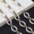 Catenina per occhiali in acrilico con anelli bianco perla e maglie dorate - Giunzione Oro Bianco Perla (GL606)