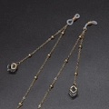Golden eyewear chain with cube crystal pendant and non-slip silicone loops for women - Gold Beaded Style With Holographic Glass Pendant