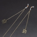 Golden eyewear chain featuring Fu and Xi character charms on a black textured background - Fortune and Joy Pendant Style