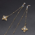 Golden eyewear chain featuring pearl flower pendants and non-slip silicone loops - Gold Pearl Flower Pendant