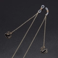 Gouden antislip brillenketting met een zwarte zwaan hanger en siliconen lusjes voor grip - Gouden Zwarte Zwaan Stijl (GL537)