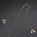 Golden eyewear chain with rainbow enamel pendants and metal beads on black background - Rainbow Gold Style (GL574)
