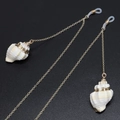 Minimalist gold metal glasses chain featuring white conch pendants with gold stripe accents - Gold