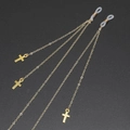 Golden metal glasses chain with cross pendants and non-slip silicone loops on dark background - Gold Cross Style (GL298)