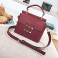 Chic burgundy crossbody bag with frosted texture and elegant gold square buckle detail - Red