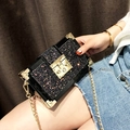 Mini black sequined crossbody box bag with gold metal corners and chain strap - Black