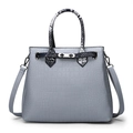 Elegant light gray faux crocodile handbag with snakeskin patterned handles and silver lock - Gray
