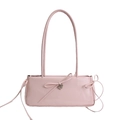 Pink rectangular underarm bag featuring a delicate bow and heart-shaped metal pendant - Pink