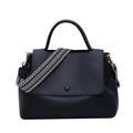 Minimalist black tote bag for women with a patterned wide strap and solid top handle - Black