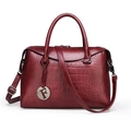 Elegant wine red crocodile pattern handbag with adjustable strap and metal F charm - Burgundy